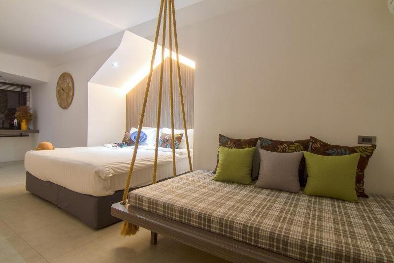 Bossotel Čiang Mai Pokoj fotografie