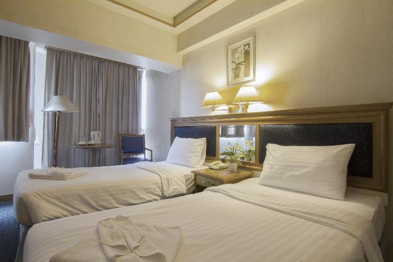 Bossotel Čiang Mai Pokoj fotografie